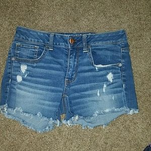 American Eagle distressed midi shorts